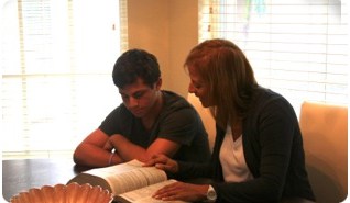 Nancy Polin tutoring male student